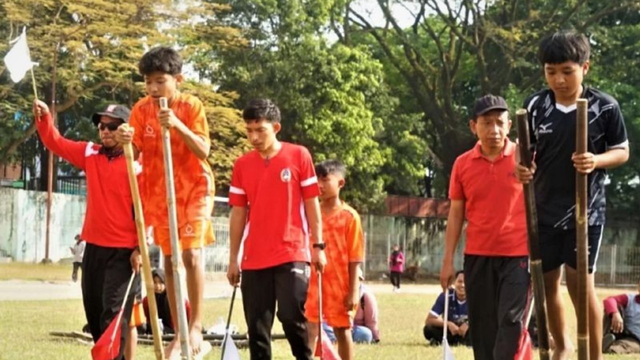 Wabup Ajak Anak-anak Lestarikan Budaya Lewat Lomba Egrang Magetan di Festival Bambu 2026