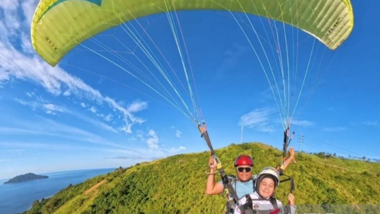 Wisata Paralayang Gorontalo Utara di Puncak Dunu Dongkrak Kunjungan Turis