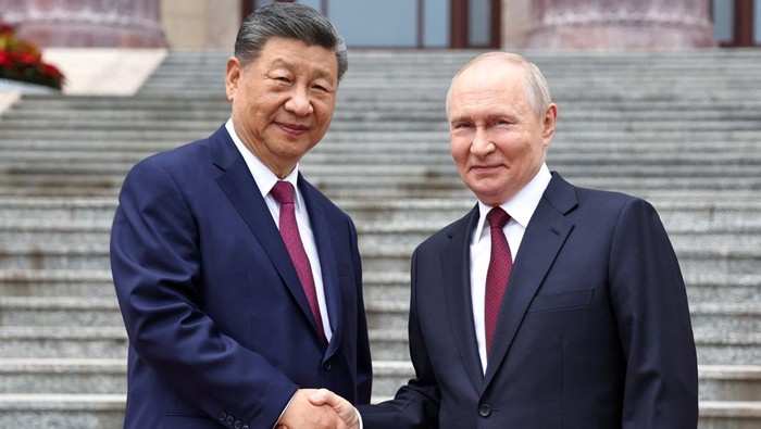 vladimir-putin-disambut-hangat-di-beijing-bertemu-xi-jinping-1779257311249_169